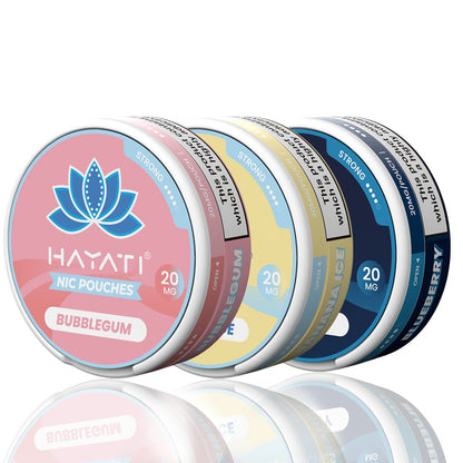 Image of three Hayati Nicotine Pouches (SNUS) tins arranged side by side. Each tin is labelled with the brand name “Hayati” and nicotine strength “20mg.” The visible flavours from left to right are Bubblegum (pink tin), Banana Ice (light blue tin), and Blueberry (dark blue tin). The tins are circular with a reflective surface underneath.