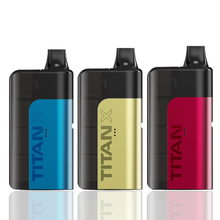 Three TITAN X vape devices in blue, gold, and red on a white background